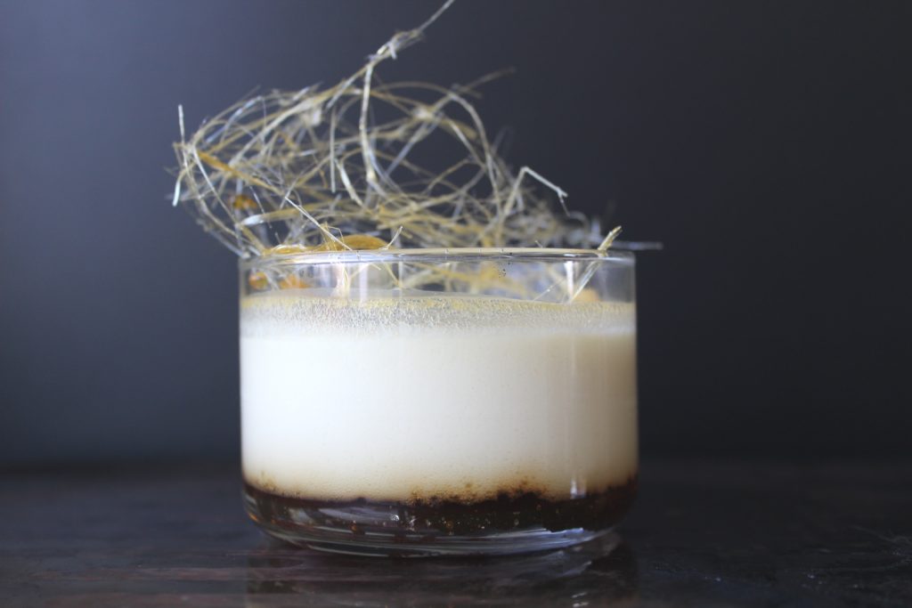 flan in a glass with sugar work on top
