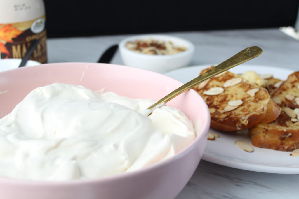 pink bowl with whipped cream