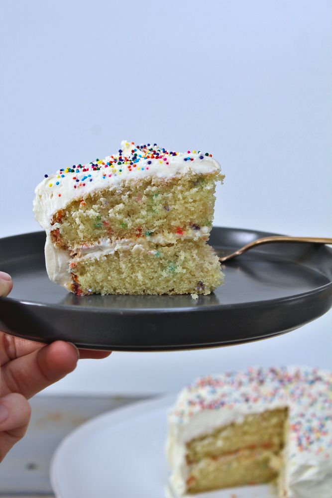 moist gluten free butter cake with white chocolate frosting