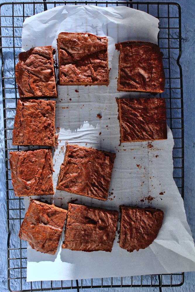 brownies cut into squares on a cooling rack