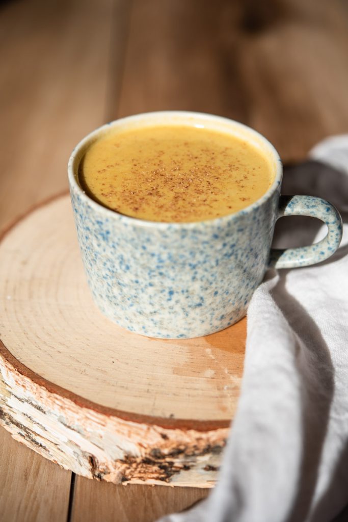 pumpkin maca latte in mug with nutmeg