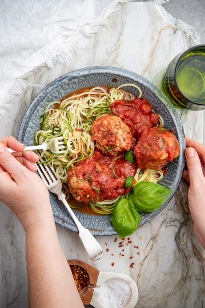 paleo gluten free jumbo meatballs over zucchini noodles with homemade marinara sauce