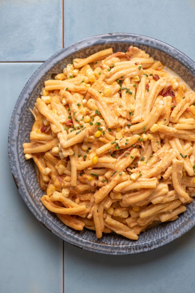 cream cheese pasta with chives, bacon, corn, and smoked paprika