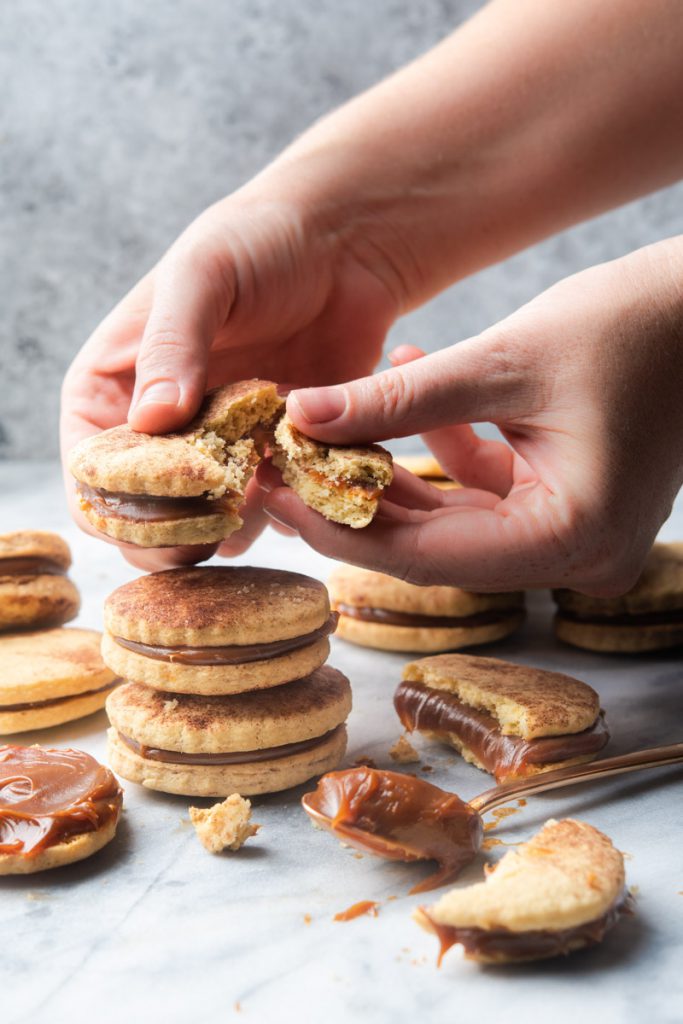 soft and tender alfajores cookies with dulce de leche caramel filling