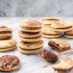 alfajores sandwich cookies with dulce de leche