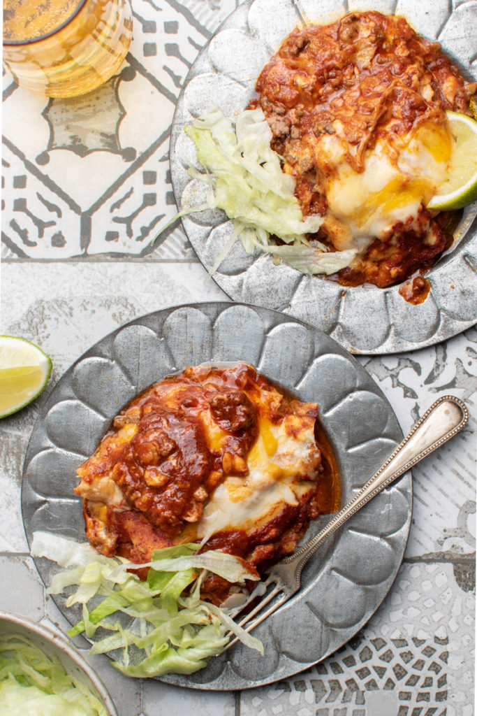 red enchiladas with ground beef and Mexican cheese