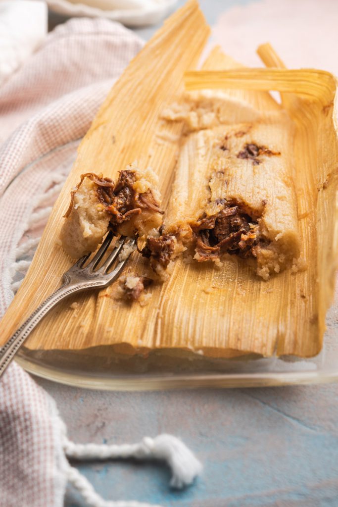 red chile shredded beef filled tamale