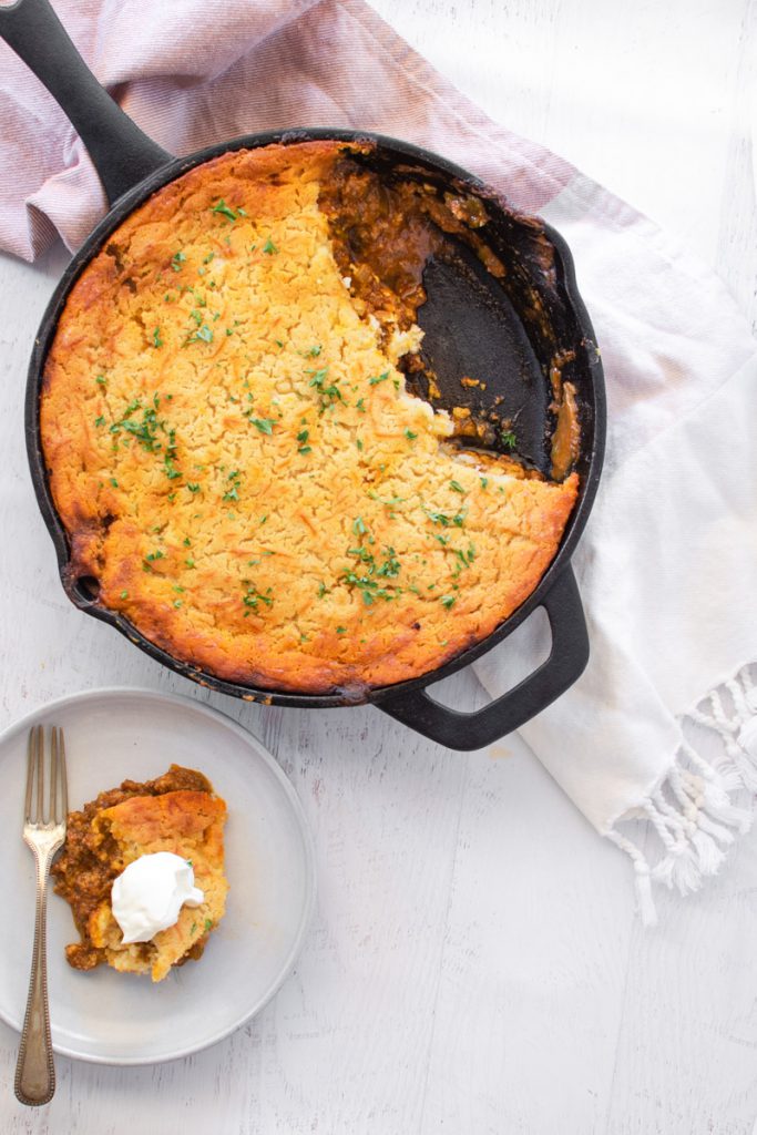 tamale pie baked in a cast iron skillet