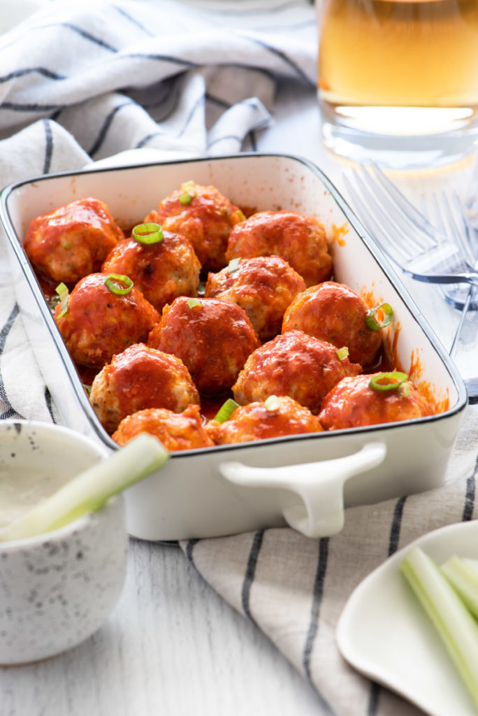 buffalo style chicken meatballs served with celery sticks and ranch