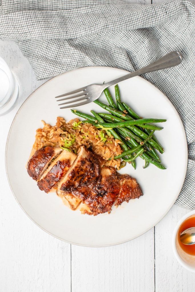 crispy chicken with honey hot sauce green beans with garlic and dirty rice